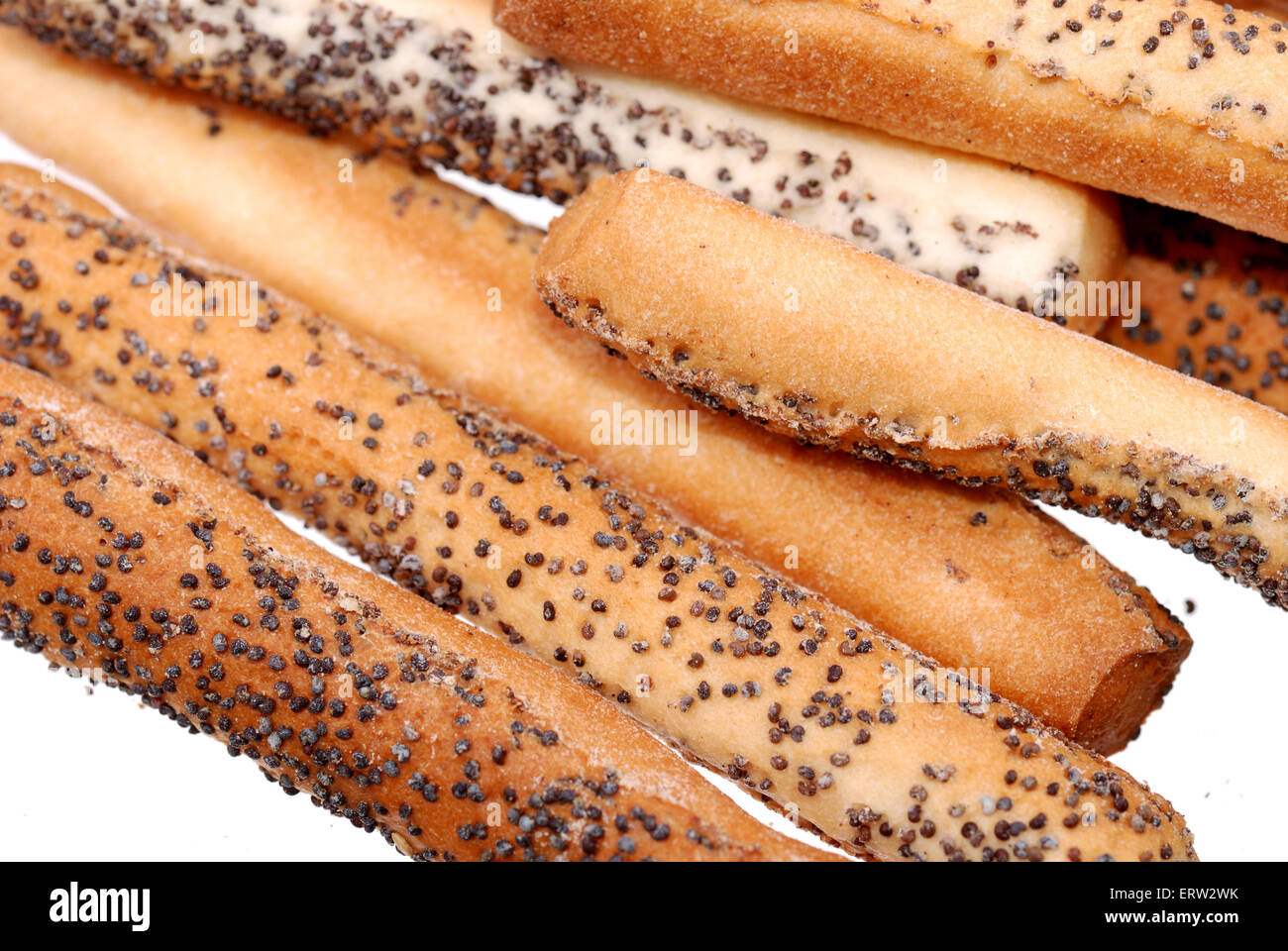 Stack of salted breadsticks with poppy seed isolated on white Stock Photo Alamy