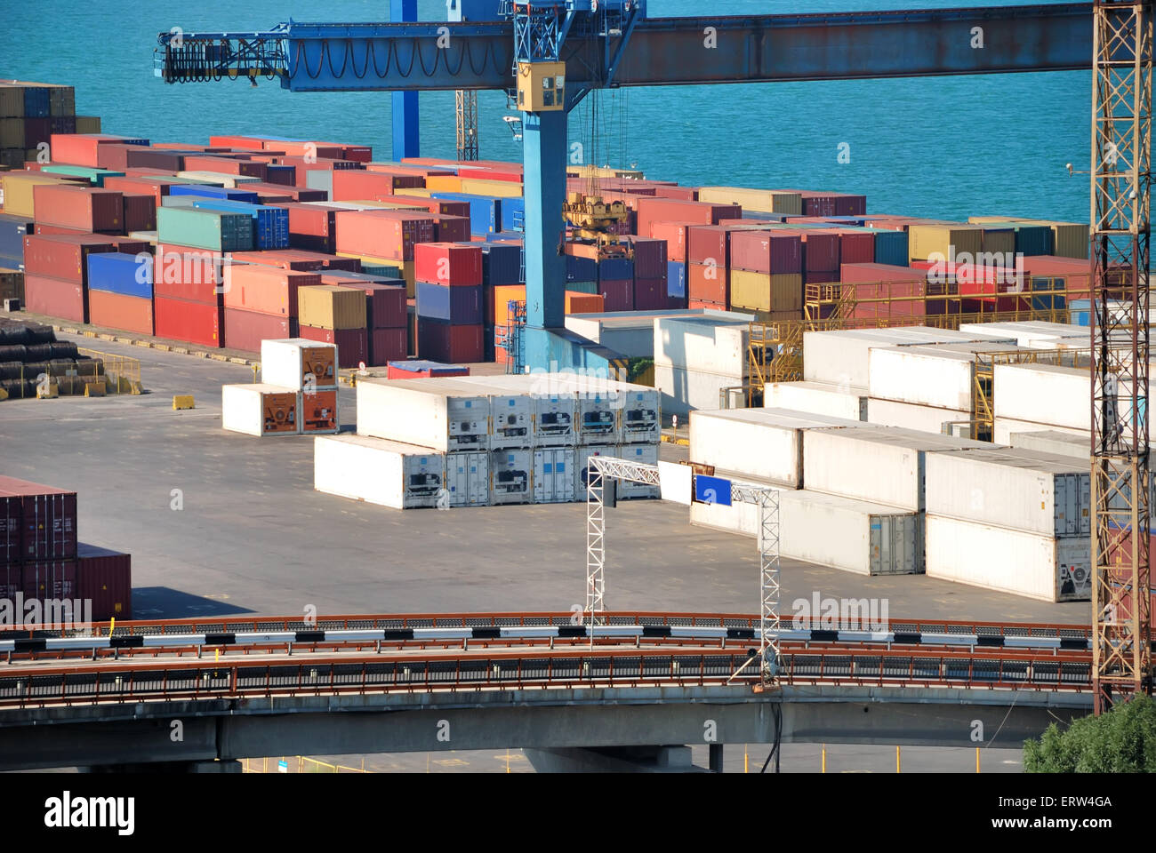 Port warehouse with containers and industrial cargoes Stock Photo