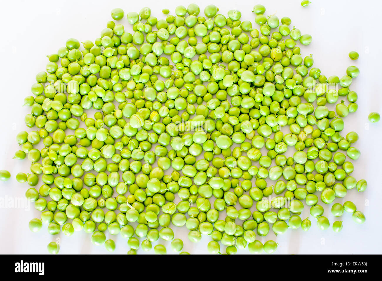 Heap of fresh peas on white background Stock Photo