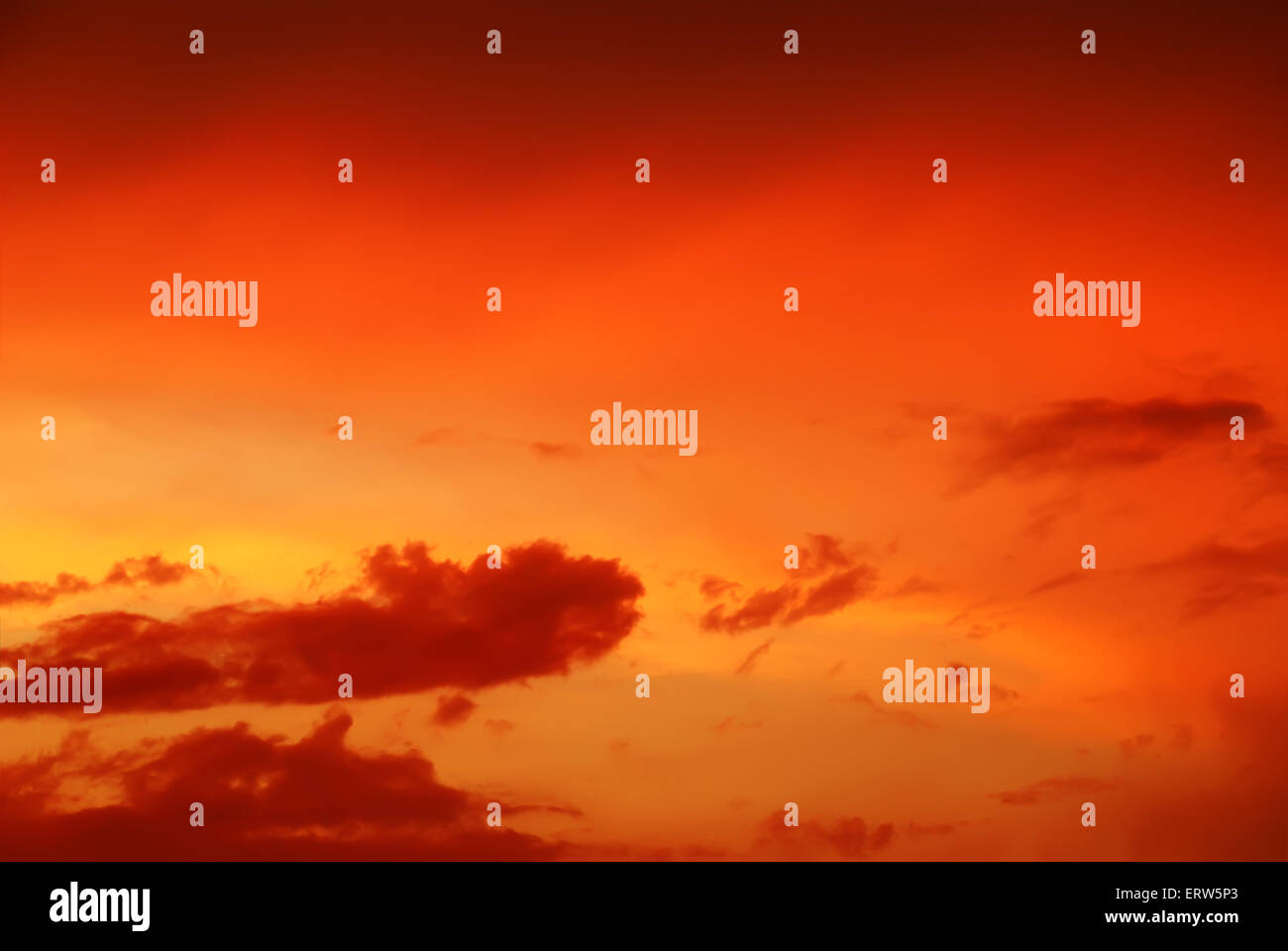 Clouds in the red sunset Stock Photo - Alamy