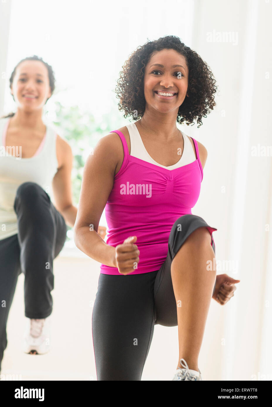 Women working out in exercise class Stock Photo