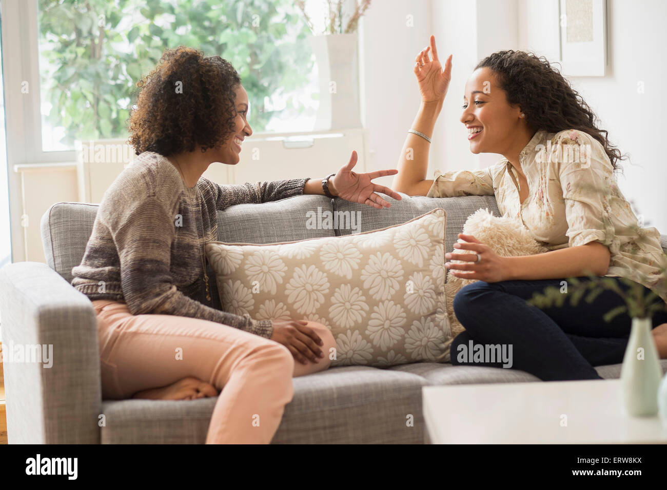 Two people talking sofa hi-res stock photography and images - Alamy