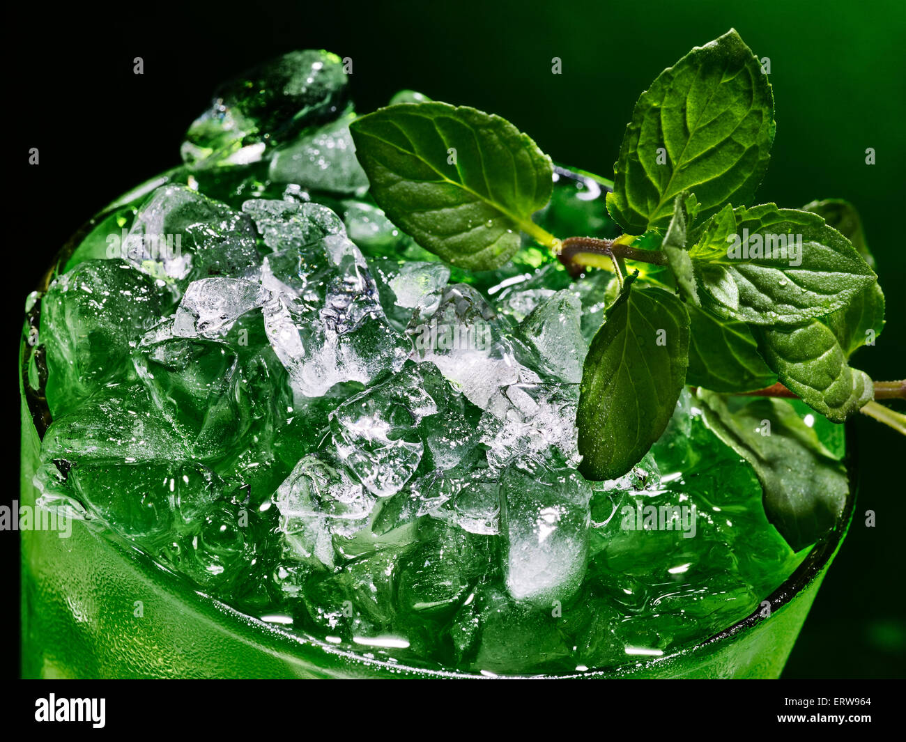 Green cocktail on dark background Stock Photo - Alamy