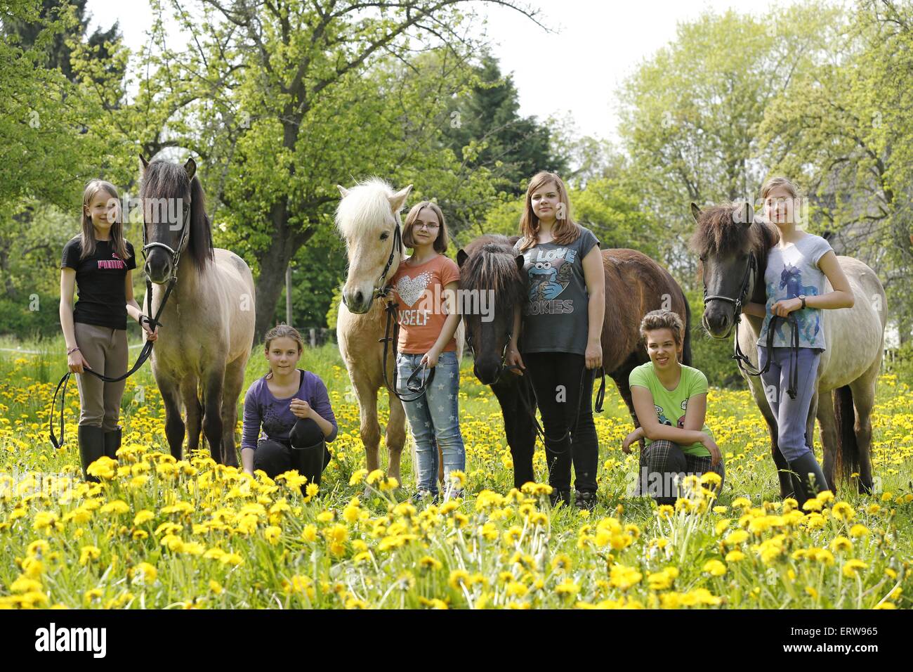 girls with ponies Stock Photo