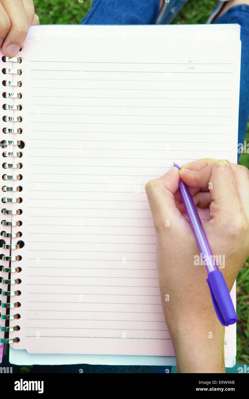 Blank note book with hand writing on it Stock Photo - Alamy
