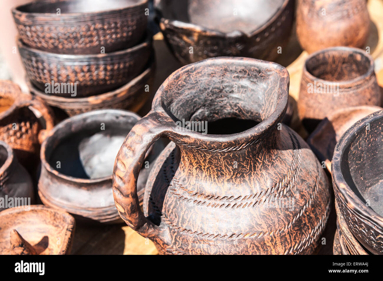 Earthenware pottery on display for sale at a local fair Stock Photo Alamy