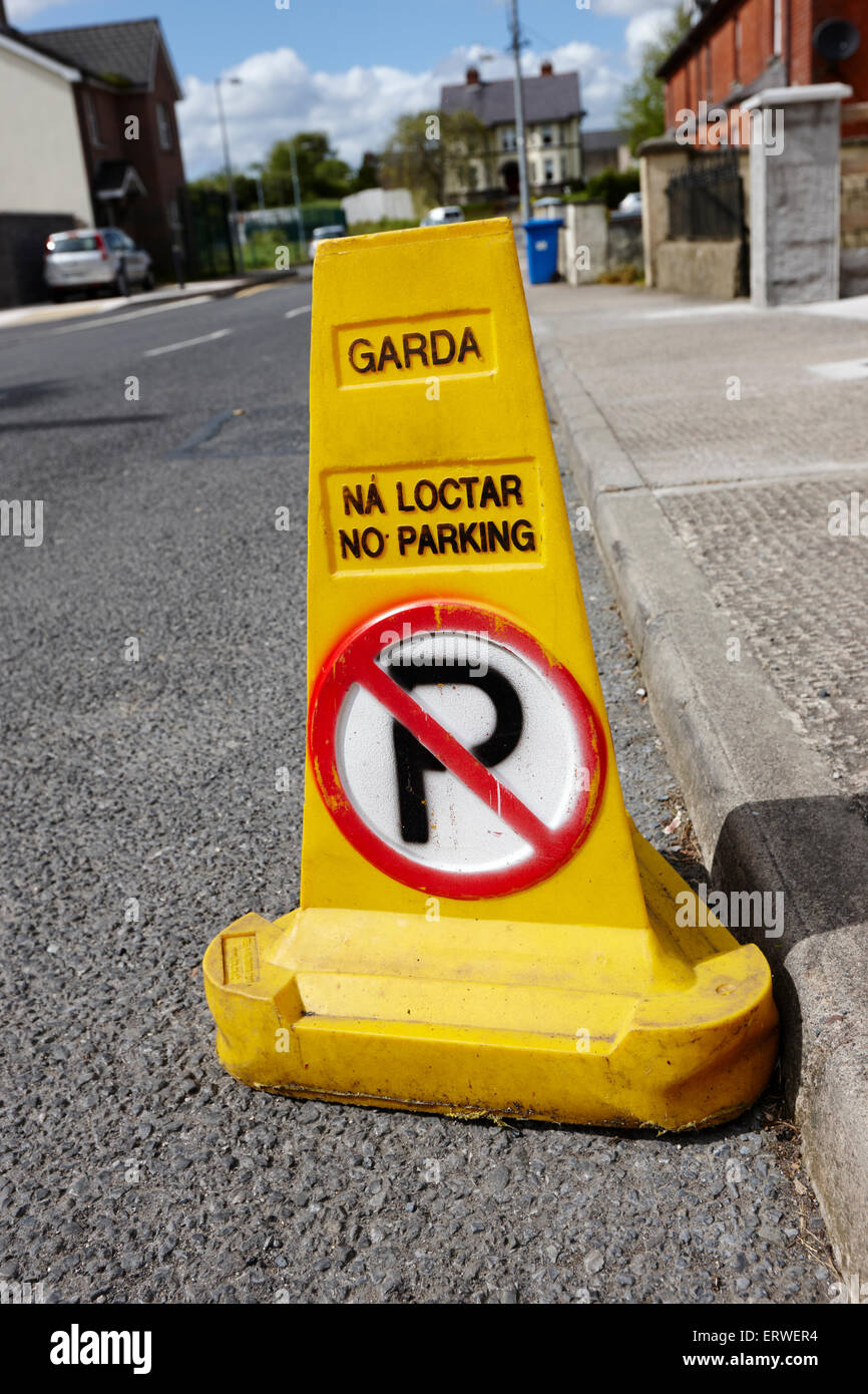 garda no parking traffic cones on a street in Clones county monaghan republic of ireland Stock Photo