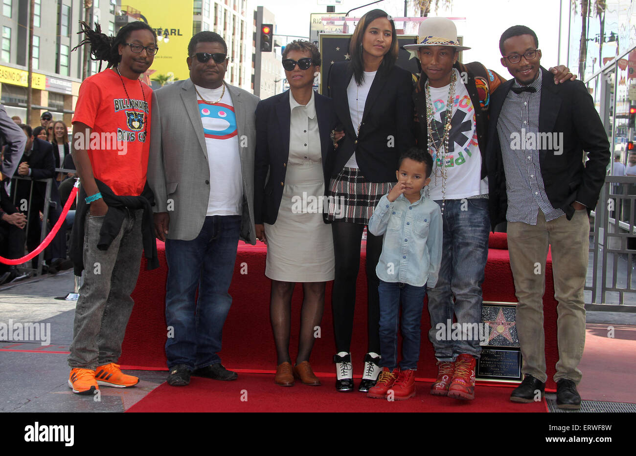 Pharrell Williams honored with a star on the Hollywood Walk of Fame  Featuring: Pharrell Williams,Helen Lasichanh,Rocket Ayer Williams,Family Where: Hollywood, California, United States When: 04 Dec 2014 Credit: FayesVision/WENN.com Stock Photo