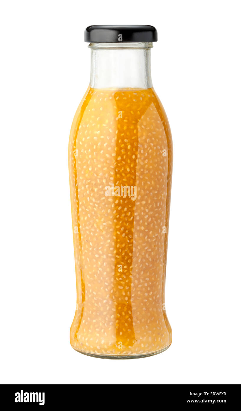 Pineapple Coconut Chia Drink in a glass bottle with a black cap Stock Photo