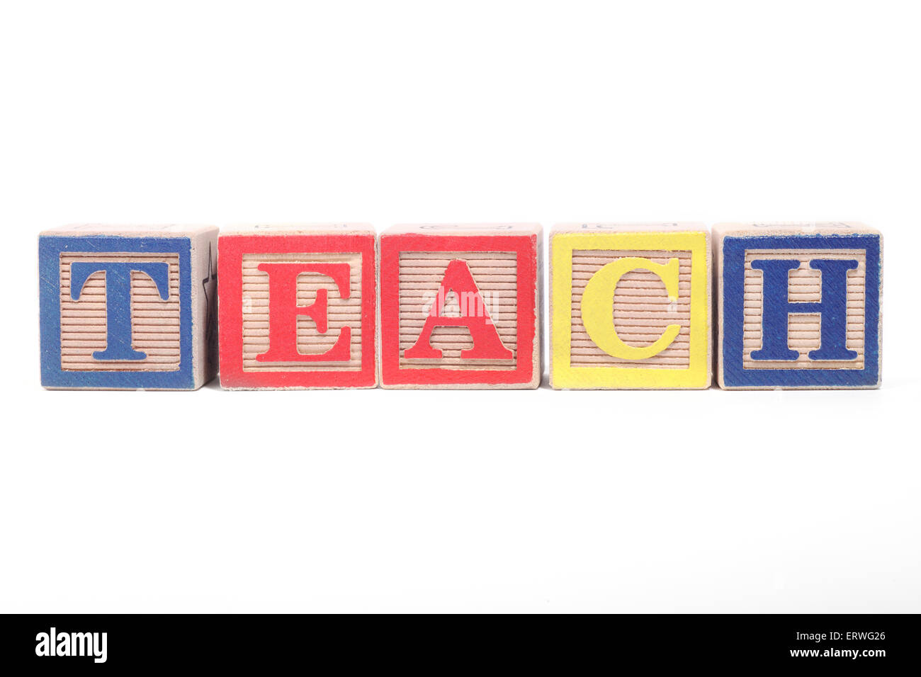 The word 'TEACH' spelt out with Children's building blocks Stock Photo