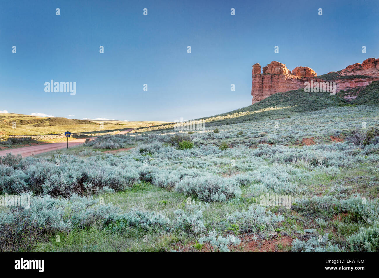prairie, shrubland and sandstone rock formation in northern Colorado near Wyoming border -Ssnd Creek National Landmark Stock Photo