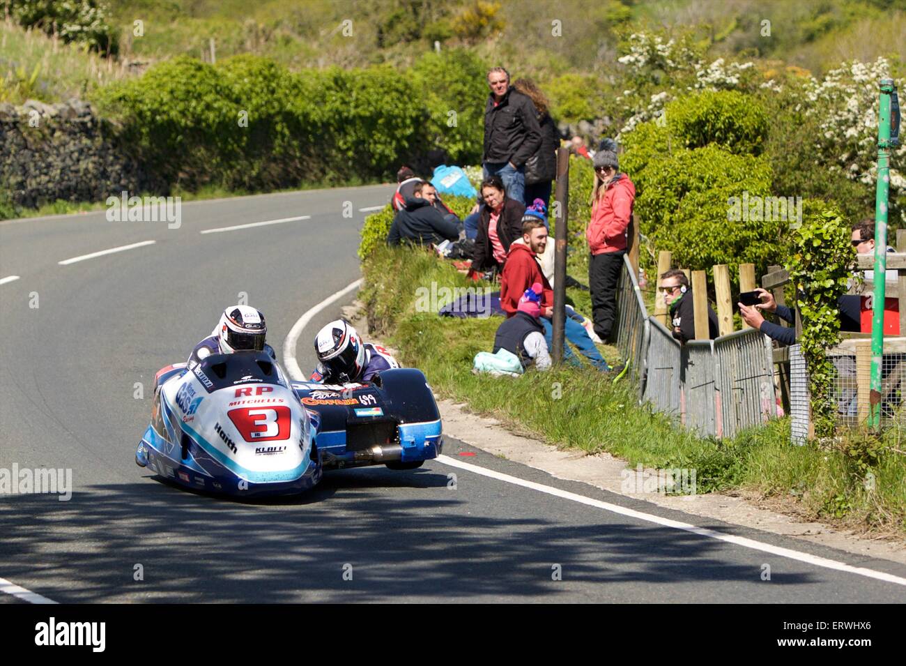 Douglas, Isle of Man. 8th June, 2015. 2015 Isle of Man TT Races. Ben Birchall and Tom Birchall in action during the TT Sidecar race. Credit:  Action Plus Sports Images/Alamy Live News Stock Photo