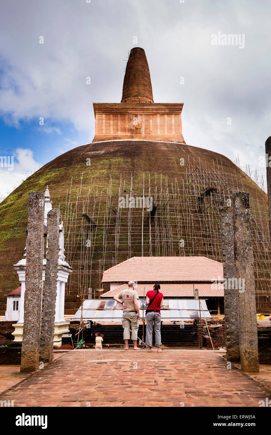 Walagamba Sacred City of Anuradhapura, tourists at the Abhayagiri Dagoba ...