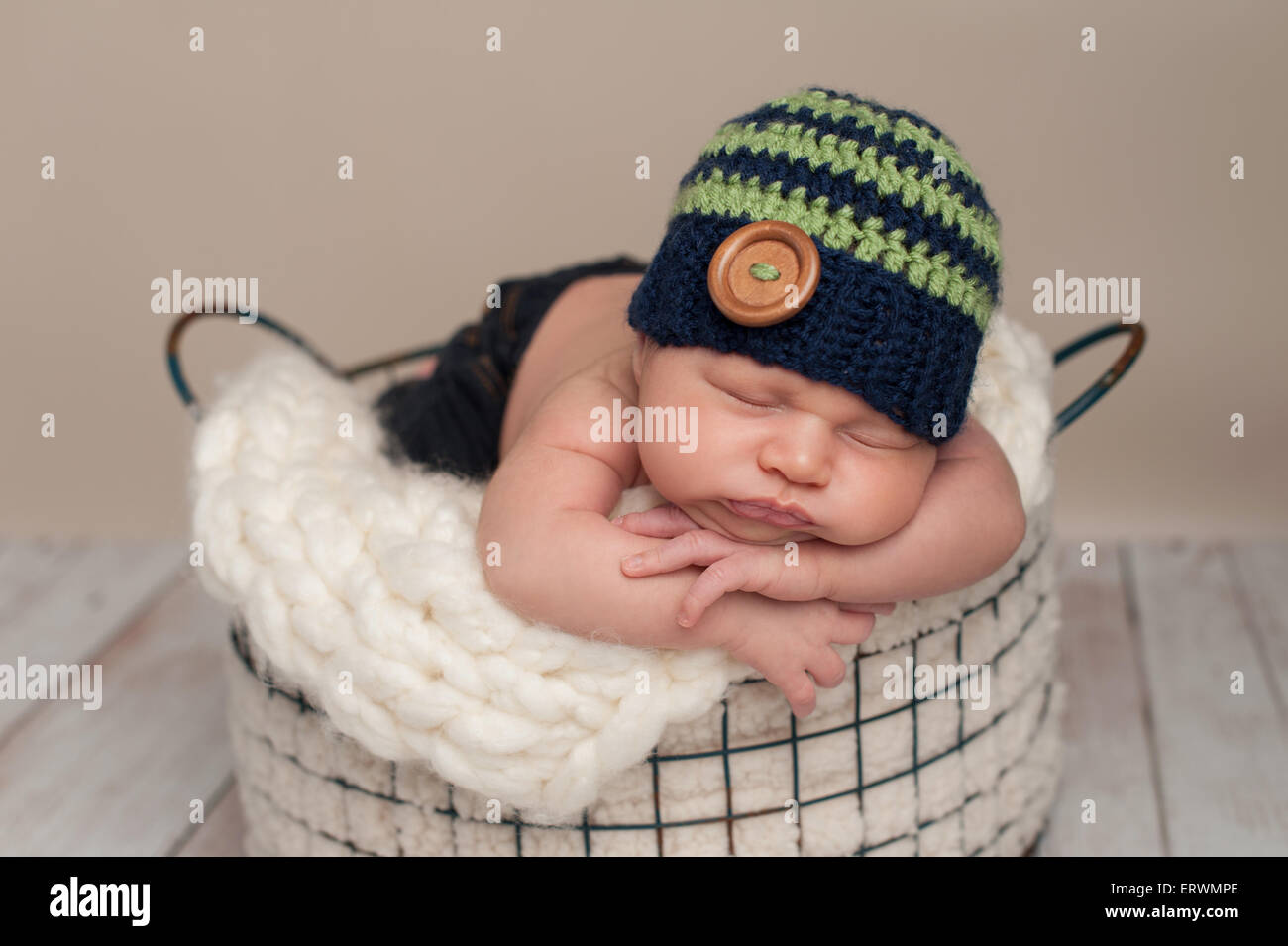 old newborn baby boy wearing jeans 