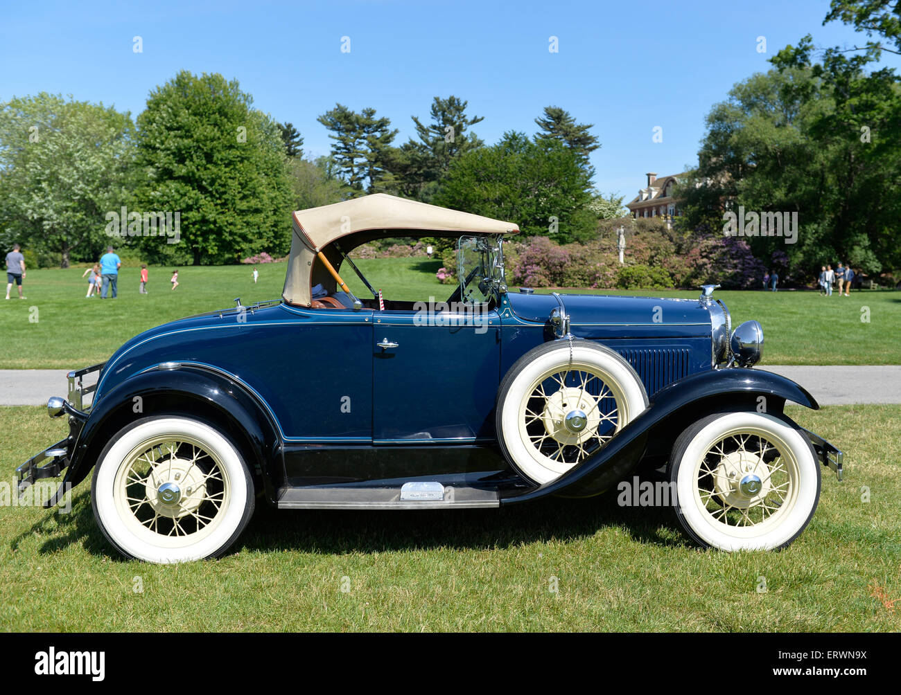 Old Westbury, New York, United States. 7th June 2015. A blue 1931 Ford Model A roadster with white wall tires, owned by Roger F. Clark of Kings Park, is shown at the 50th Annual Spring Meet Car Show sponsored by Greater New York Region Antique Automobile Club of America. Over 1,000 antique, classic, and custom cars participated at the popular Long Island vintage car show held at historic Old Westbury Gardens. Stock Photo