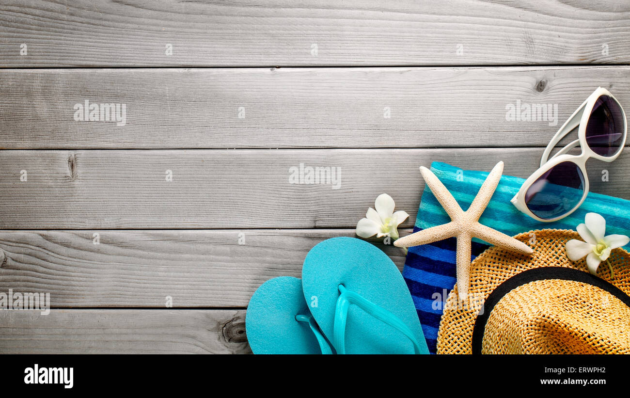 Beach accessories on wooden board Stock Photo