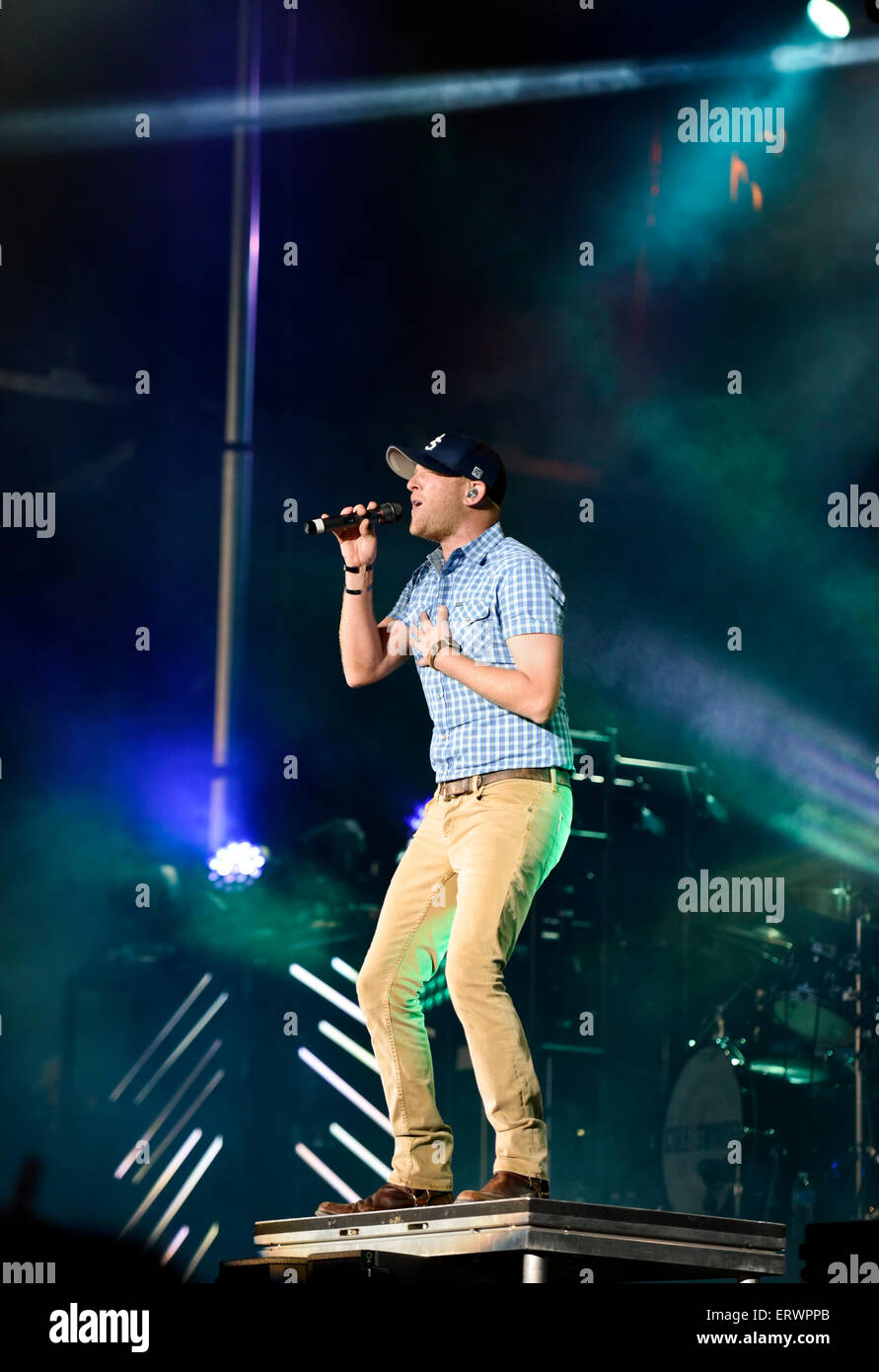 Cole Swindell performing at the Carolina Country Music Festival at