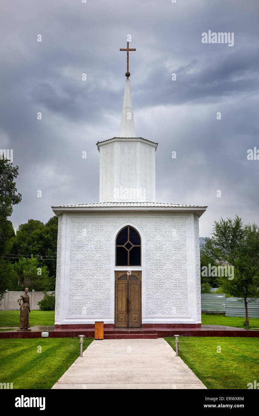 Catholic church in Ruh Ordo cultural complex near Issyk Kul lake at overcast sky in Cholpon Ata, Kyrgyzstan Stock Photo