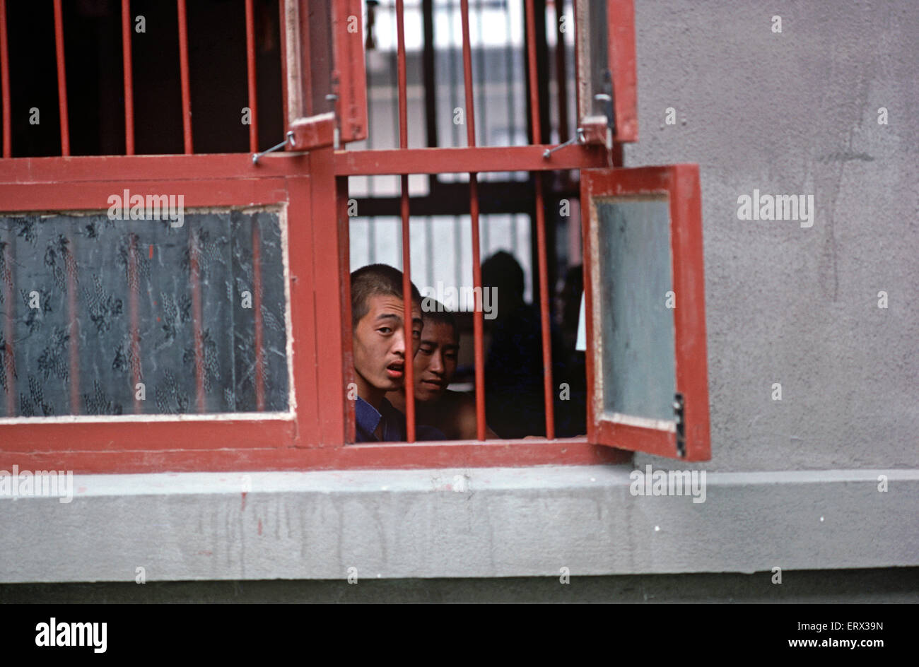 Chinese youth prisoner in Chengdu Youth Detention Center dormitory, 1980s Stock Photo