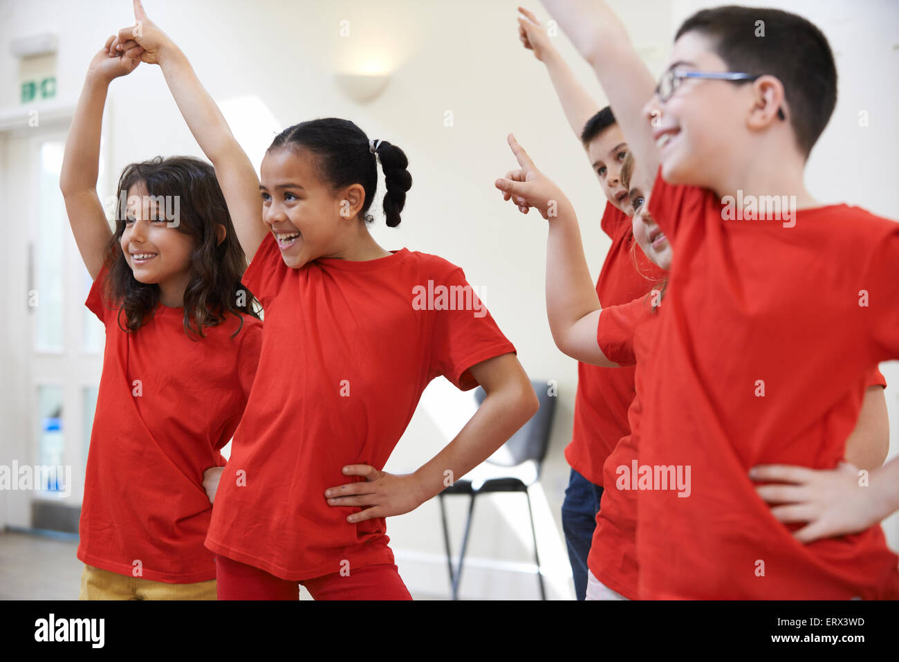 Group Of Children Enjoying Drama Class Together Stock Photo
