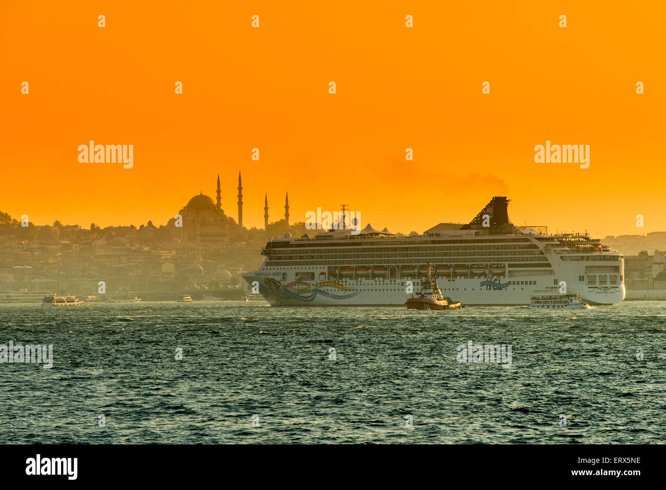 Norwegian Spirit cruise ship departing under the sunset golden light, Istanbul, Turkey Stock Photo
