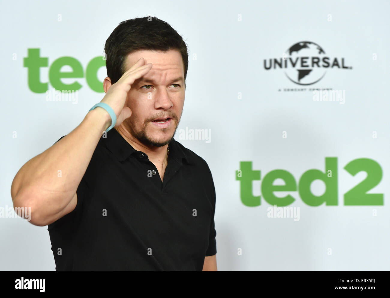 Berlin, Germany. 09th June, 2015. US American actor, singer, and film producer, Mark Wahlberg, poses during a press meeting for the film 'TED 2' in the Ritz Carlton Hotel in Berlin, Germany, 09 June 2015. The comedy arrives to German cinemas on 25 June 2015. Credit:  dpa picture alliance/Alamy Live News Stock Photo