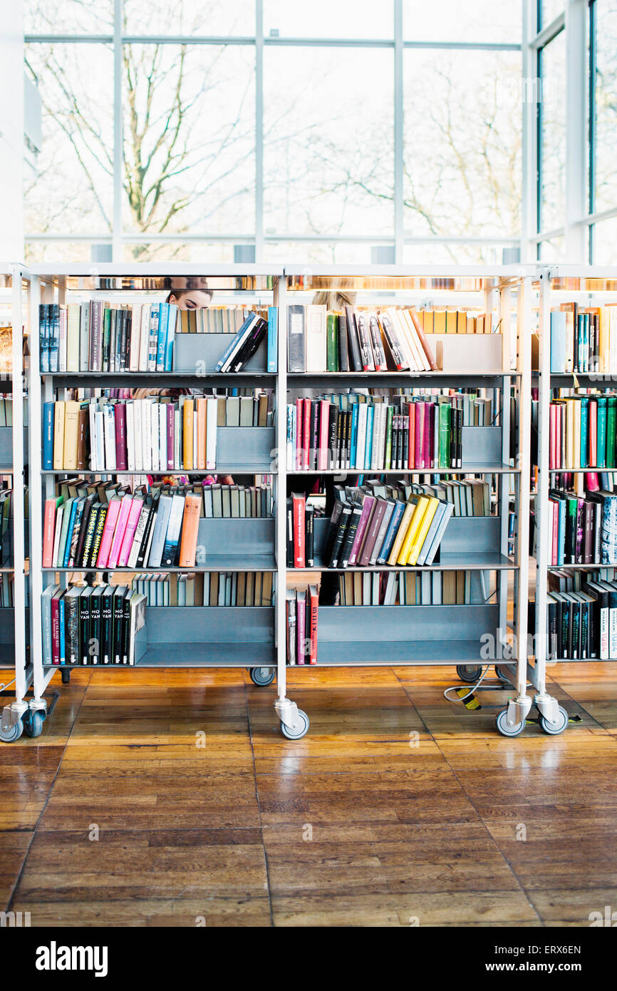 Books arranged in shelf hires stock photography and images Alamy