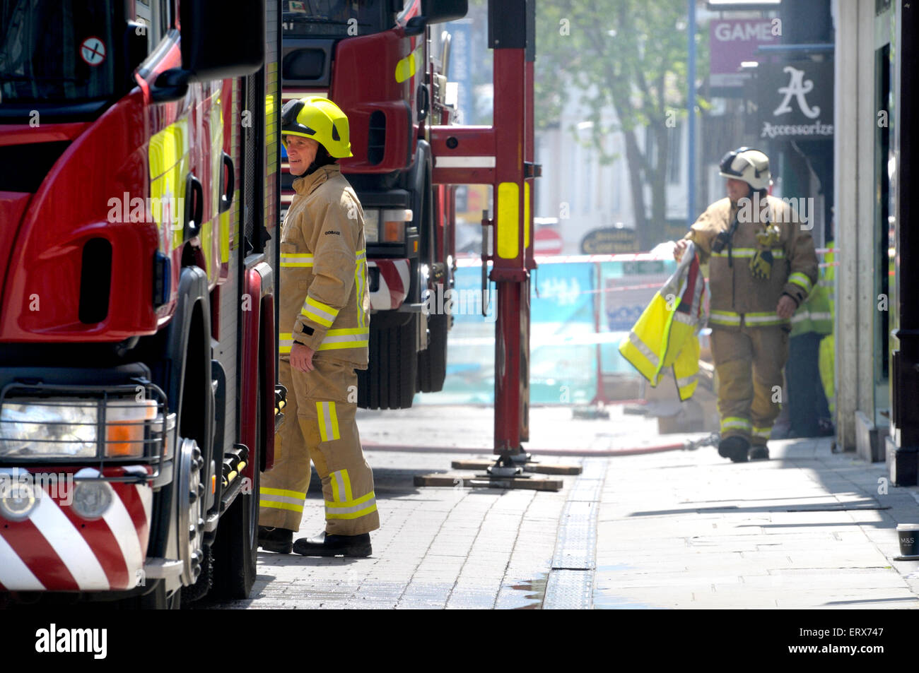 Maidstone, Kent, England, UK. Firefighters at a fire in the town centre Stock Photo