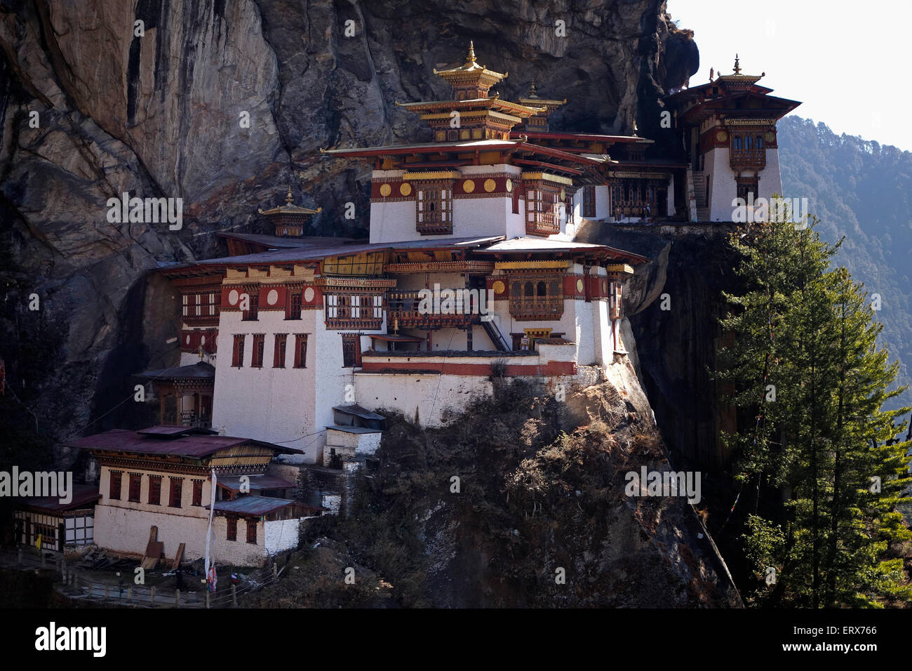 View of Paro Taktsang also known as the Taktsang Palphug Monastery and the Tiger's Nest) a prominent Himalayan Buddhist sacred site and temple complex located in the cliffside of the upper Paro valley in Bhutan. Stock Photo