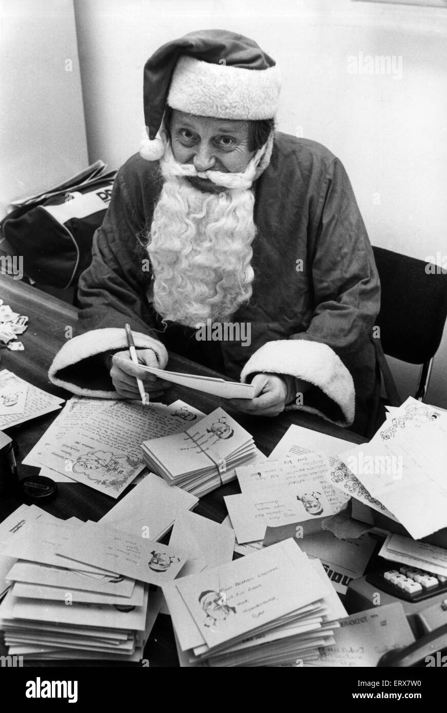 Santa Claus, sorting letters at Guildhall, Swansea, Wales, 13th December 1985.  The letters, mostly addressed to Toyland, Fairyland, Heaven and the North Pole, have been redirected to the council offices at the rate of 100 a day. Stock Photo