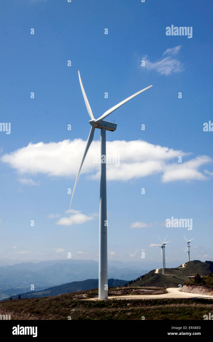 a detail turbine of a wind farm with a blue sky Stock Photo - Alamy