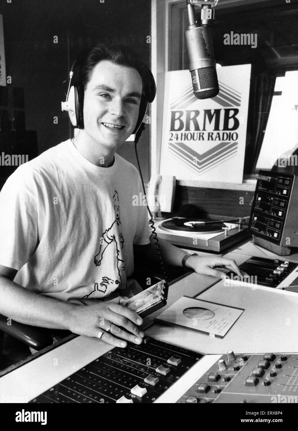 BRMB Disc Jockey Graham Torrington, who is sitting in for Breakfast Show host Les Ross during his two-week holiday. 22nd September 1988. Stock Photo