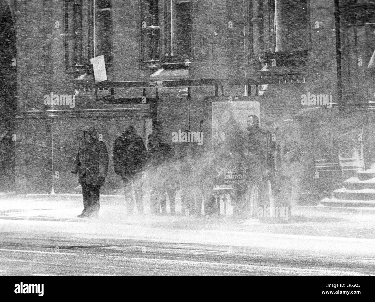 Blizzard conditions felt by Teessiders as they wait for a bus outside the Town Hall, Middlesbrough, 15th February 1979. Stock Photo