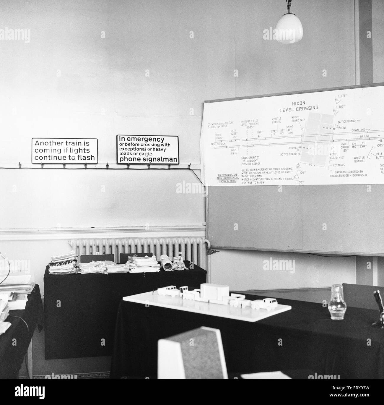 Model showing the transformer transport as it crossed the Hixon level crossing and diagram on the wall of the court room at the Hixon Rail Inquiry. 26th February 1968 Stock Photo