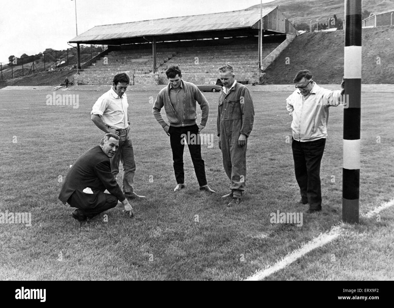 Members and players of the Penygraig Rugby Club pictured at their new ground which they have built on the site of the old Naval Colliery, Penygraig. L-R Mr Gwyn Dackins, Stuart Smith, Glyn Owen, Syd Anthony and Mel Harcombe. 1st September 1970. Stock Photo