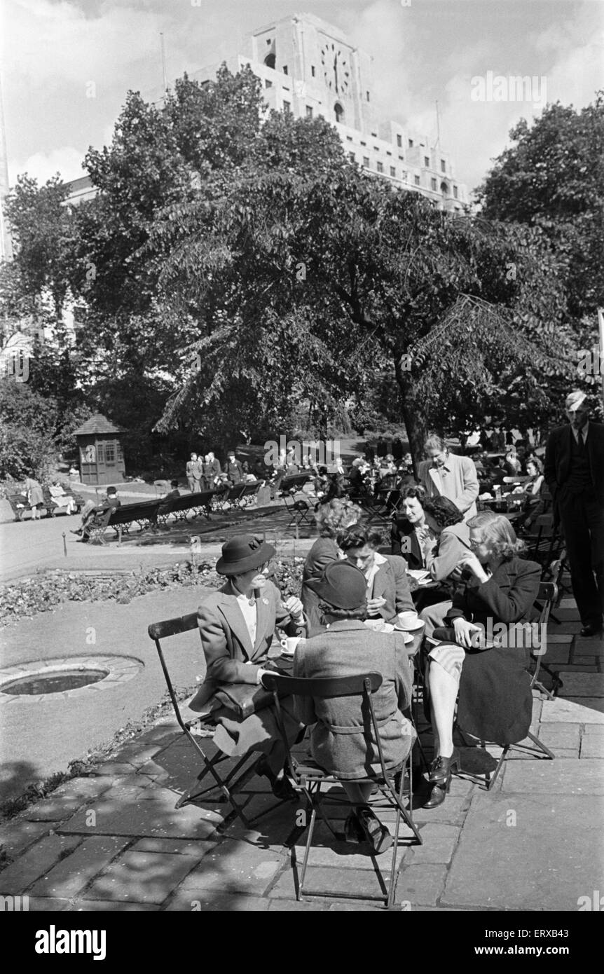 Ladies enjoying afternoon tea in Victoria Gardens on the Embankment, London,  26th August 1946. Stock Photo