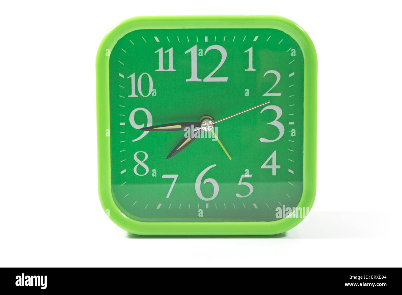 Green alarm clock isolated on white Stock Photo