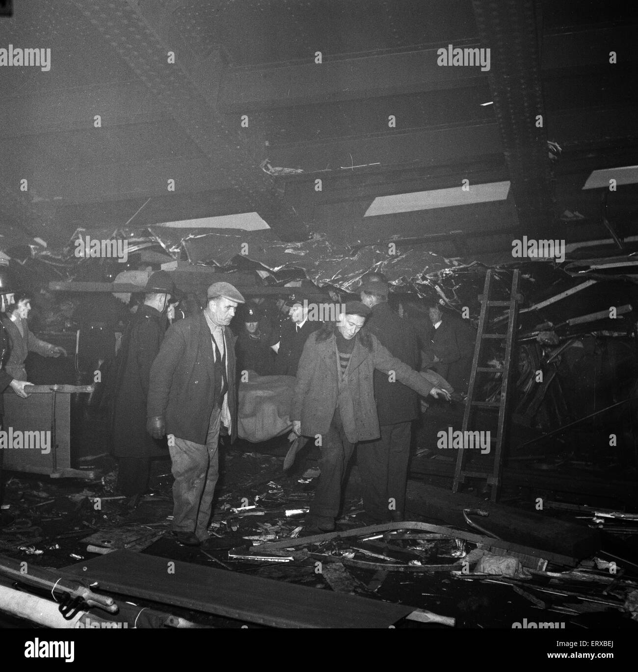 Lewisham Train Crash. On the evening of 4 December 1957 a dense blanket of fog covered London and trains were running late. The 5:18 pm Charing Cross to Hayes consisting 10-car electric multiple units carrying nearly 1,500 passengers stopped at a danger signal at Parks Bridge Junction on the Lewisham by-pass line under a bridge carrying rail tracks over the line. Trains were running out of order because of the fog and the Parks Bridge Junction signalman wished to speak to the driver by the telephone at the signal to confirm the train's identity and destination. Stock Photo