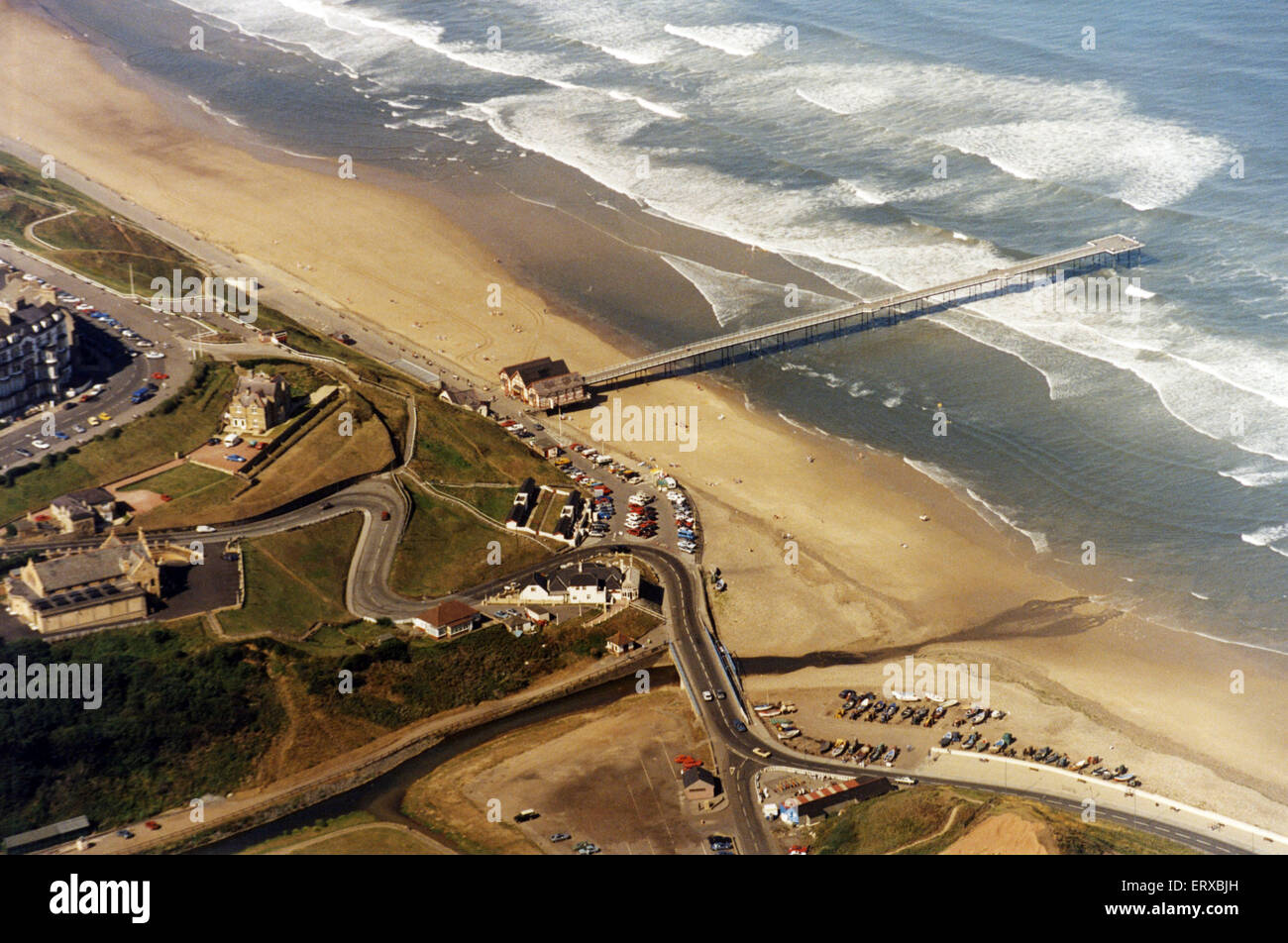Aerial view of Saltburn beach, pier and cliff lift. 7th September 1991. Stock Photo