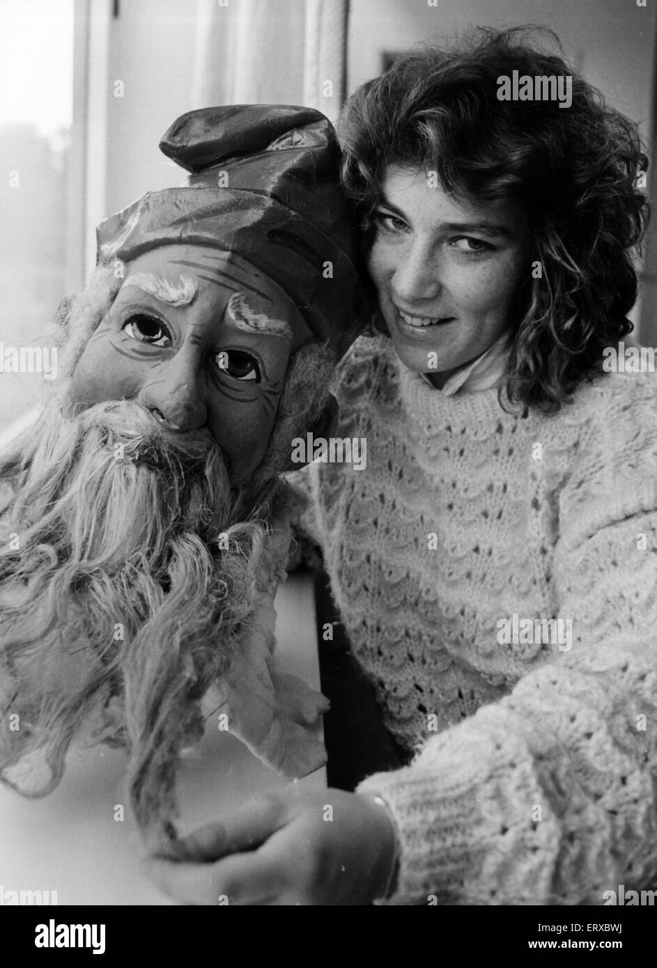 Wendy Morgan, staff member at the Welsh Folk Museum, pictured with 1909 father christmas head, Cardiff, Wales, 6th November 1987. Stock Photo