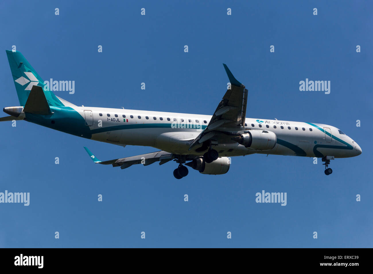 Embraer EMB195LR operated by Air Dolomiti on approach for landing  Prague, Czech Republic Stock Photo