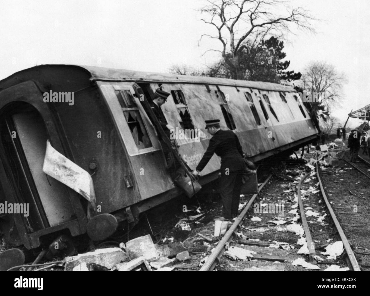 Morpeth Rail Crash On 7 May 1969 a northbound sleeper express train from London to Aberdeen derailed on the Morpeth curve. Six people were killed, 21 were injured and the roof of the station's northbound platform was damaged.  Police are seen in our picture removing luggage from one of the wrecked sleeper carriages Stock Photo