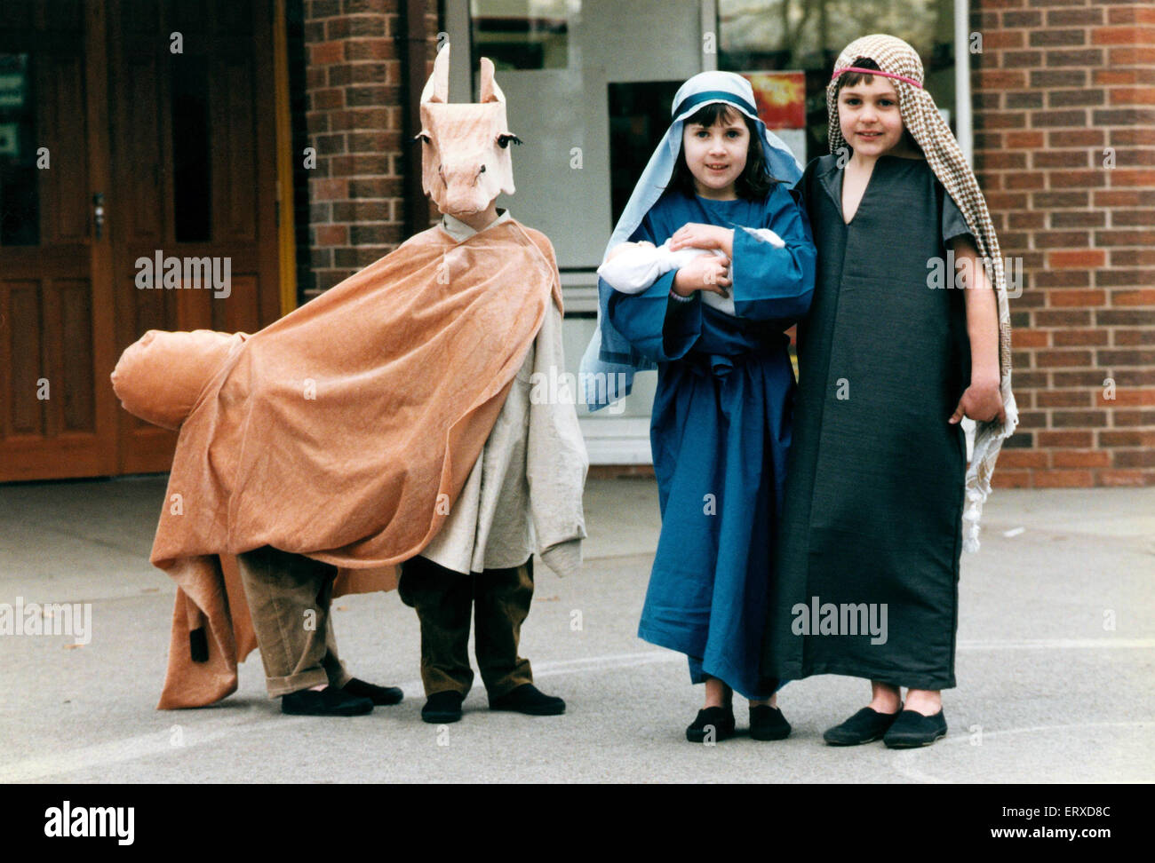 Emma Beckett as Mary is watched by Joseph (Andrew Murphy) at Childwalll C of E School in Woolton Road. 14th December 1995. Stock Photo