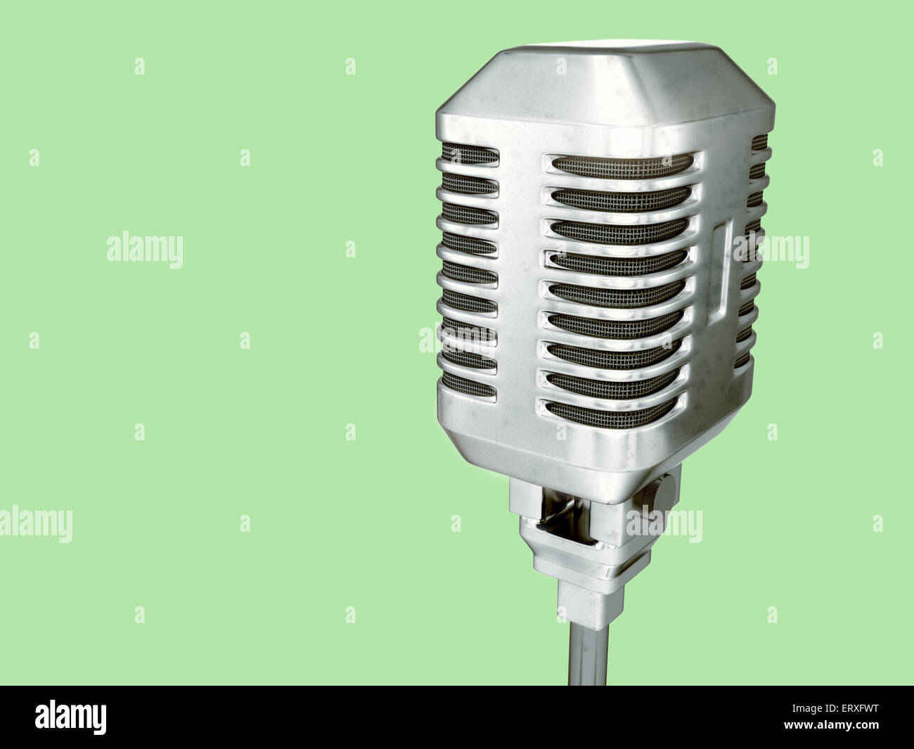 Retro microphone - isolated on green background Stock Photo