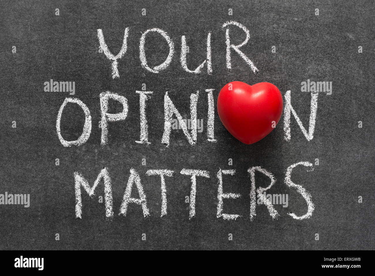 your opinion matters phrase handwritten on blackboard with heart symbol instead of O Stock Photo
