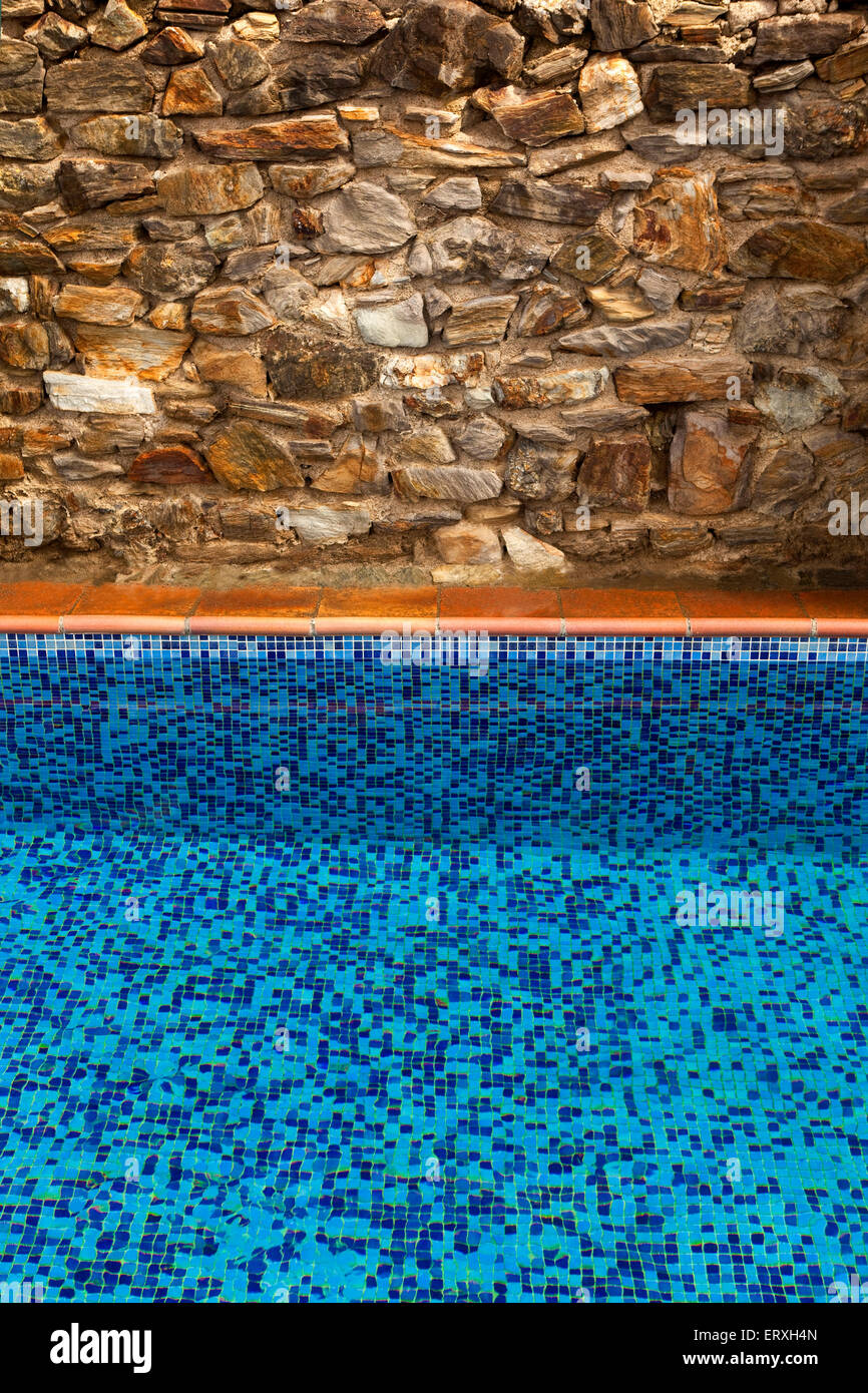 Pool and stone wall in a French garden Stock Photo Alamy