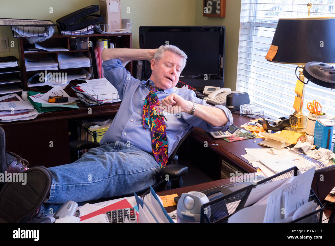 Businessman in Hoarders' Messy Home Office, USA Stock Photo Alamy