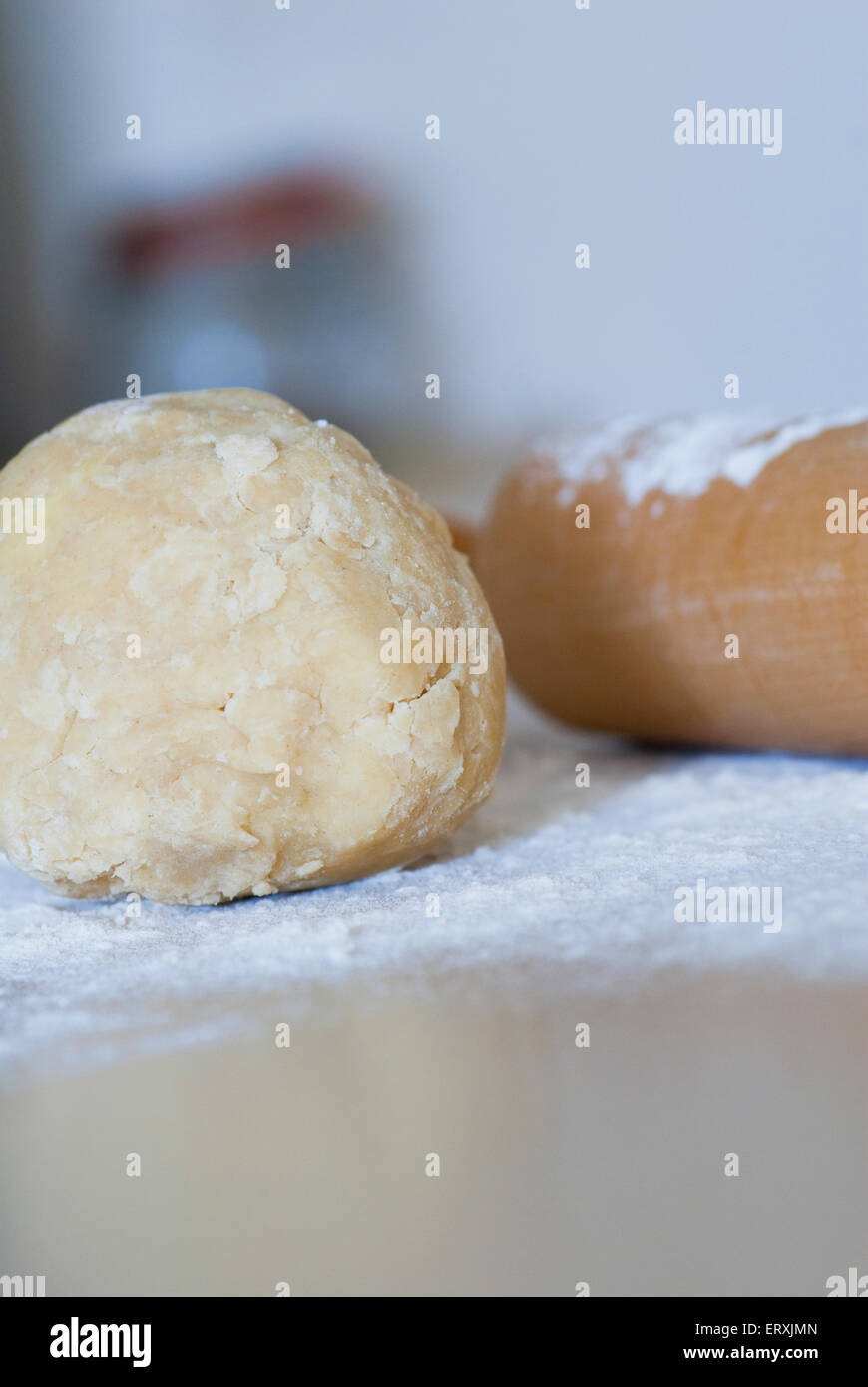 Still life food image of short crust pastry and rolling pin - ready to roll out Stock Photo