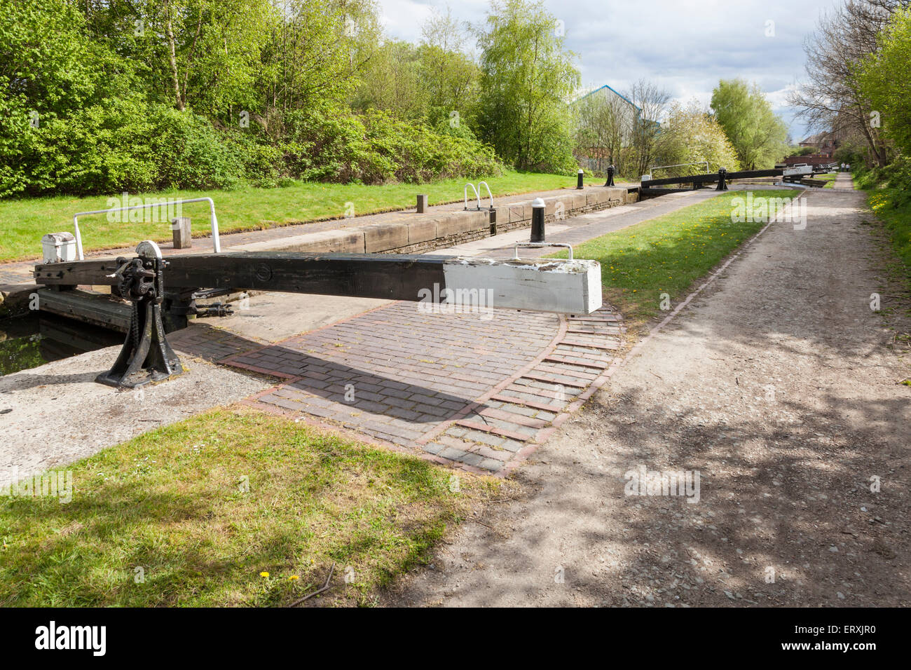The balance beam and towpath at Lock number 3 on the Walsall Branch Canal, West Midlands, England, UK Stock Photo