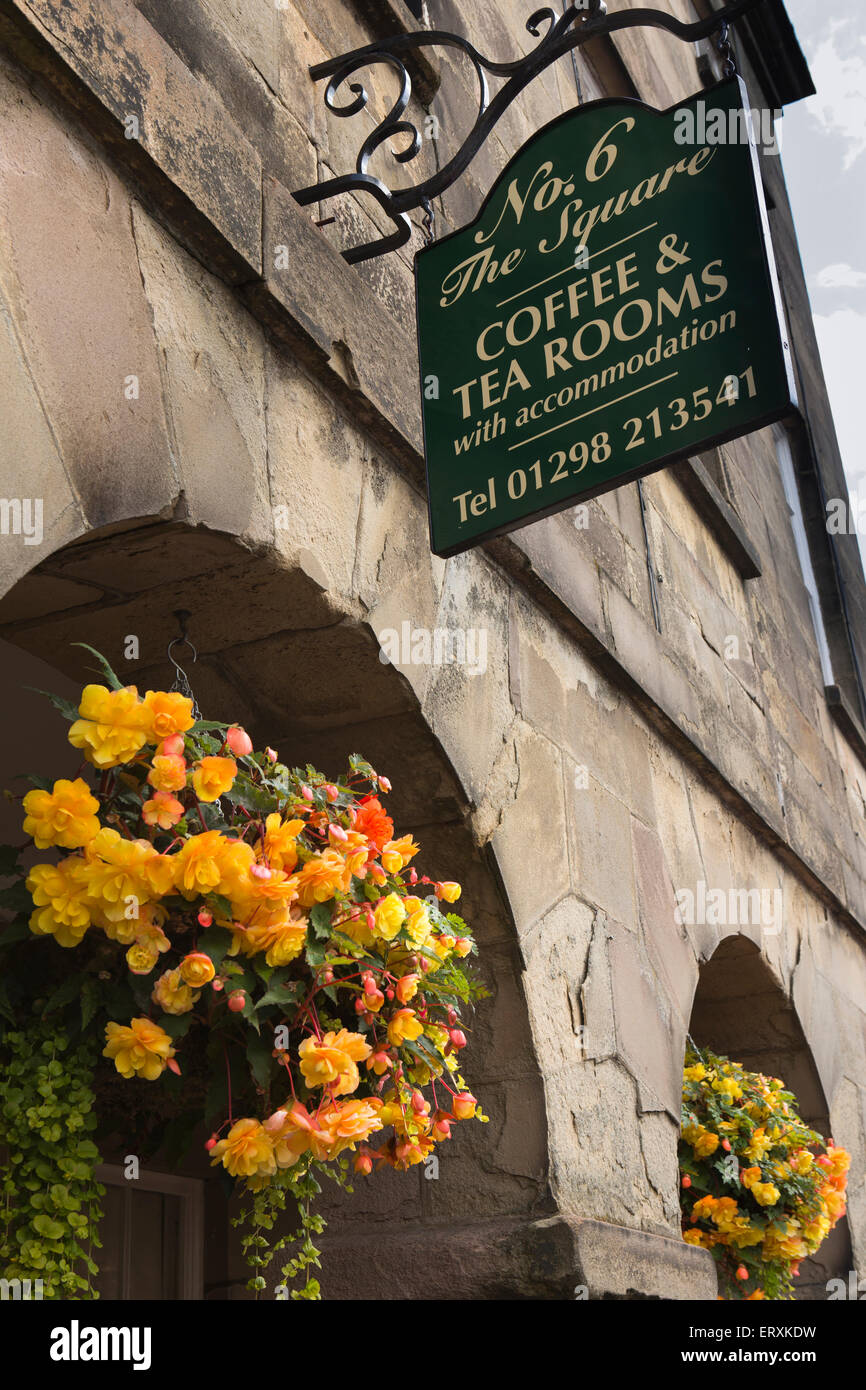 UK, England, Derbyshire, Buxton, The Square, No 6 Tea and Coffee Rooms sign with hanging baskets Stock Photo